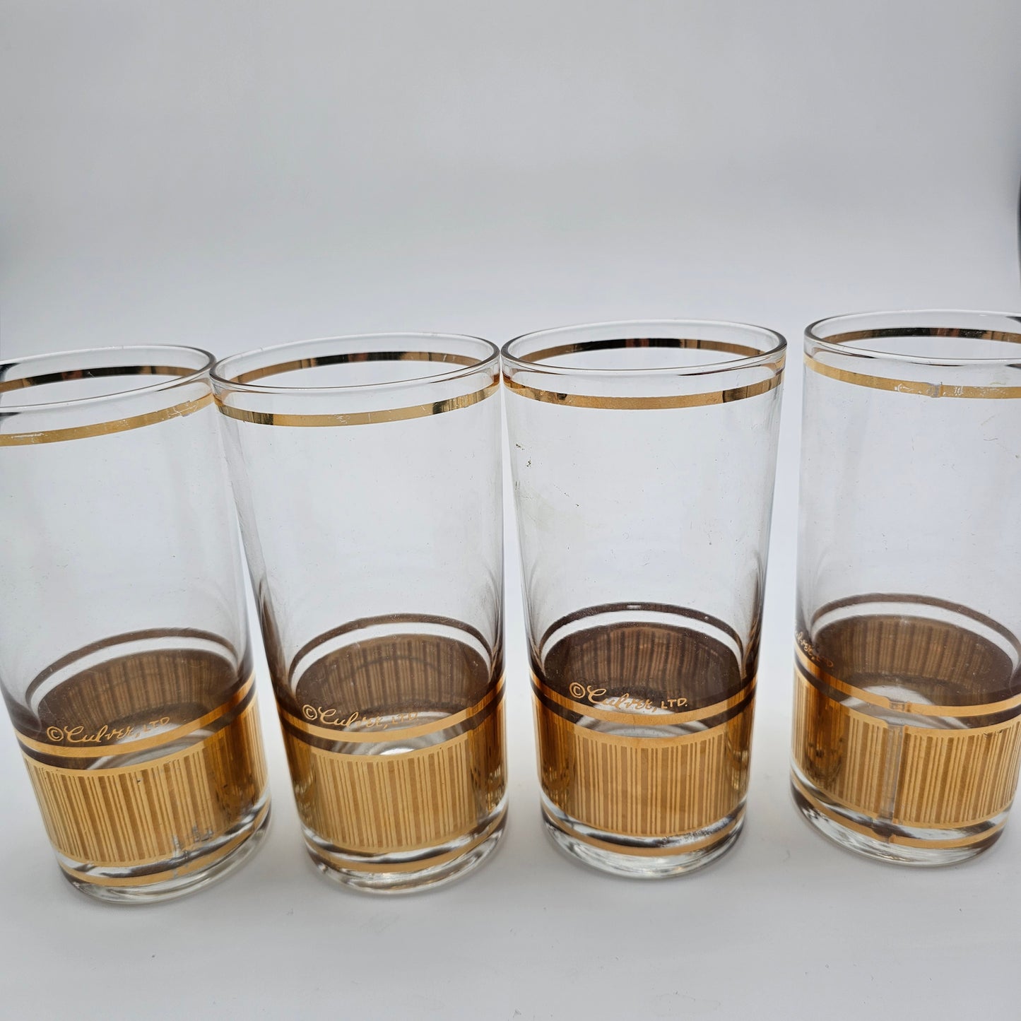 Mid-century modern gold accented barware glassware signed Culver