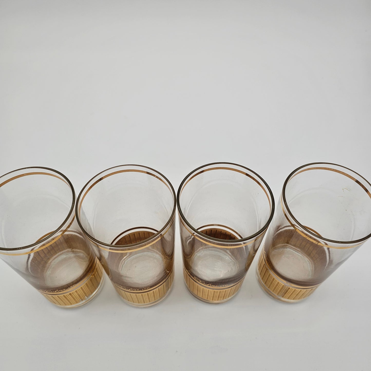 Mid-century modern gold accented barware glassware signed Culver