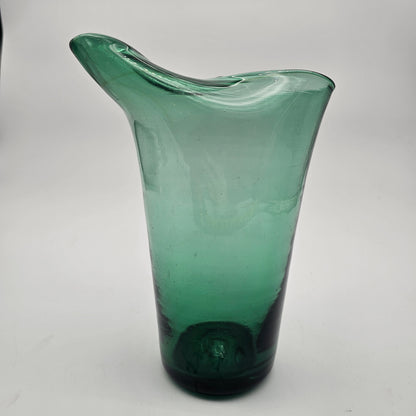 Hand blown pinched spout green glass pitcher